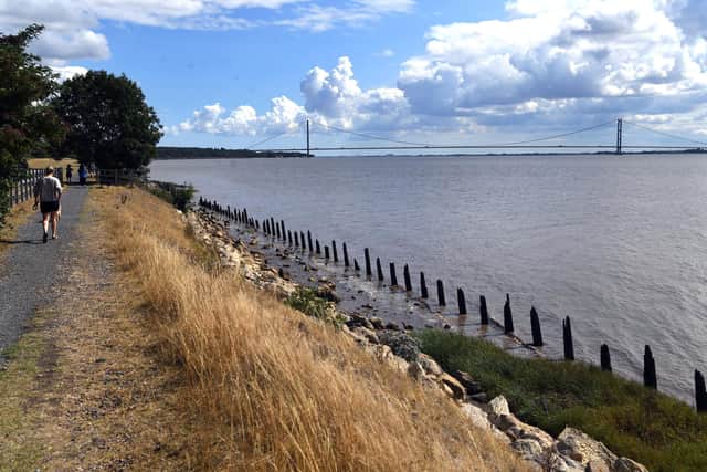 Humber foreshore walk looking out to the Humber Bridge in North Ferriby.