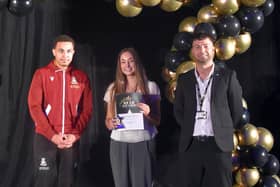 Faye Oxley receiving her awards from Lewis Richards (left) and Nicky Betteridge from Bradford College