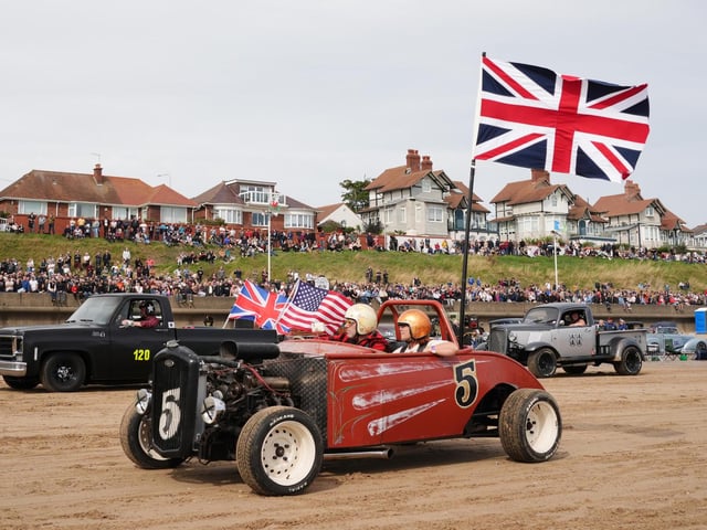 Vehicles perform 'spirited drag-races' in pairs over a 200 yard course marked in the fresh tidal sand.