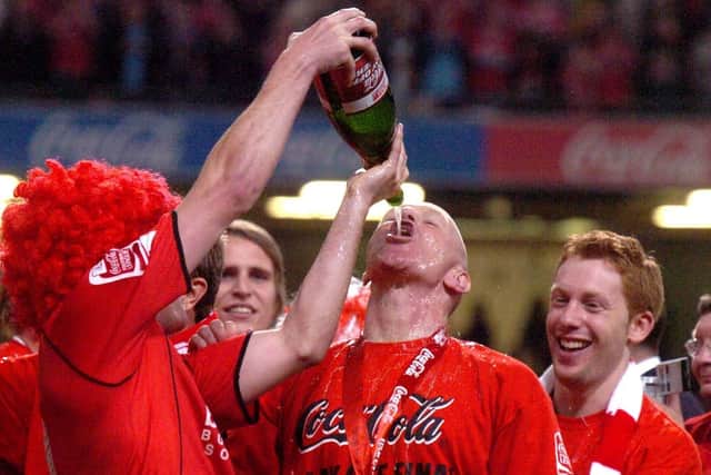 DRINKING IT IN: Barnsley manager Andy Ritchie celebrates their 2006 League One play-off victory over Swansea City with champagne