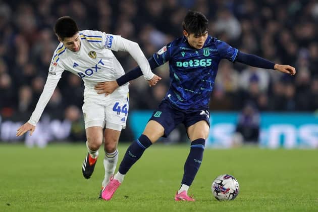 HARD GRAFT:  Leeds United midfielder Ilia Gruev challenges Stoke City's Bae Jun-Ho