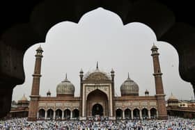 Indian Muslims celebrate Eid al Fitr at the end of the month of Ramadan in 2018, after the sighting of the new crescent moon. (Picture: CHANDAN KHANNA/Getty Images)