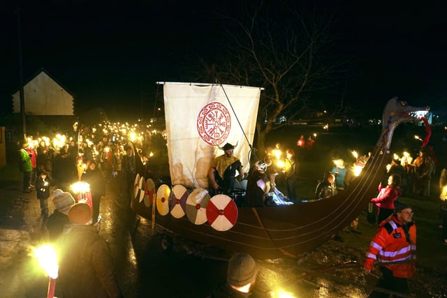Viking reenactors during the Flamborough Fire Festival, a Viking themed parade in aid of charities and local community groups, held on New Year's Eve in Flamborough near Bridlington, Yorkshire. Picture date: Saturday December 31, 2022.