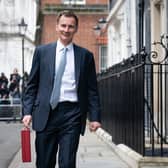 Chancellor of the Exchequer, Jeremy Hunt, leaves 11 Downing Street with his ministerial box before delivering his Budget (Photo by Stefan Rousseau - WPA Pool/Getty Images)