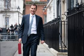 Chancellor of the Exchequer, Jeremy Hunt, leaves 11 Downing Street with his ministerial box before delivering his Budget (Photo by Stefan Rousseau - WPA Pool/Getty Images)