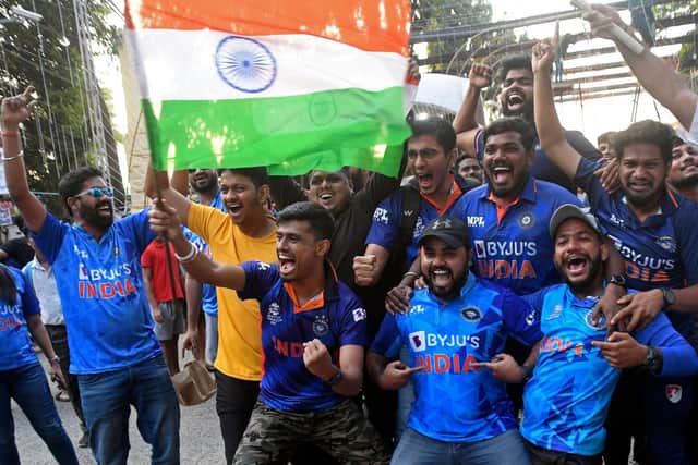 They'll be dancing on the streets of Mumbai - and they were, quite literally, as fans back home celebrated India's incredible World Cup win against Pakistan. Photo by AFP via Getty Images.
