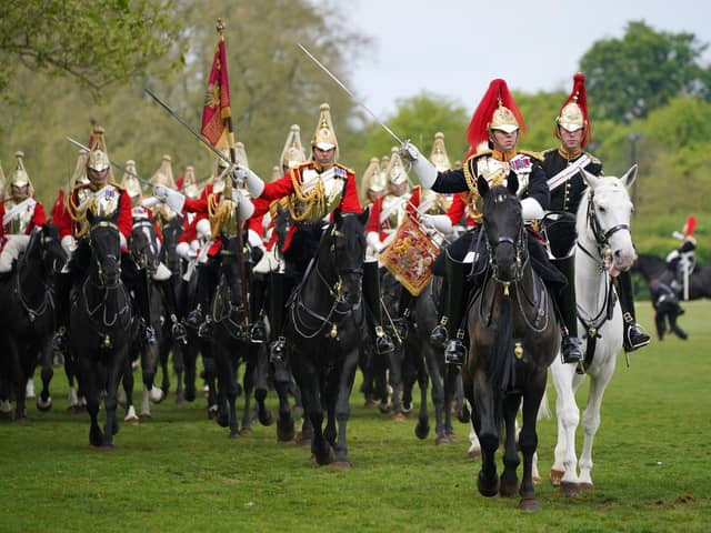 Members of the Household Cavalry on parade in Hyde Park, London. PIC: Jonathan Brady/PA Wire