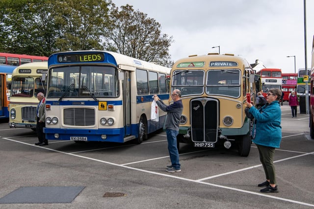 Transport enthusiasts photograph the buses