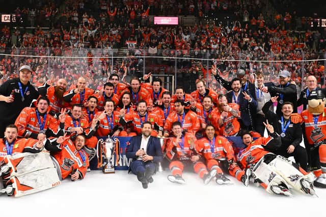 CHAMPIONS: Sheffield Steelers' players, coaches and staff celebrate their first Elite League championship since 2016. Picture: Dean Woolley/Steelers Media.