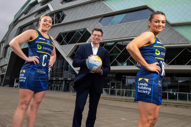 Leeds Rhinos Netball's new recruits Elle McDonald, left, and captain Nia Jones, right, at the First Direct Arena where they will be playing this season with Rob Howse, Leeds Building Society's Chief Operations Officer. (Picture: Bruce Rollinson)