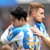 A disconsolate looking Yuta Nakayama, pictured after coming off with a knee injury in Huddersfield Town's game with Leeds United on Saturday. He was replaced by goalscorer Michal Helik. Photo by Ed Sykes/Getty Images.