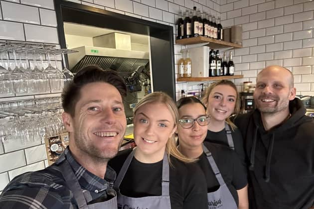 Eddie Copley-Farnell (left) with Curious Coffee Company staff. Picture is from The Curious Coffee Company/Facebook