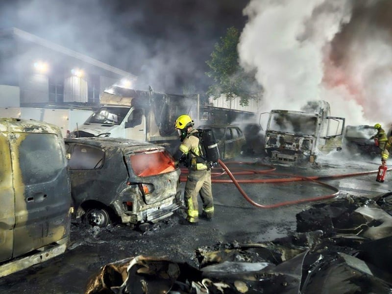 More than 50 cars and two motorcycles were involved in the fire.