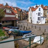 These are the best places to go for a springtime walk in the UK. Pictured is Robin Hood's Bay.