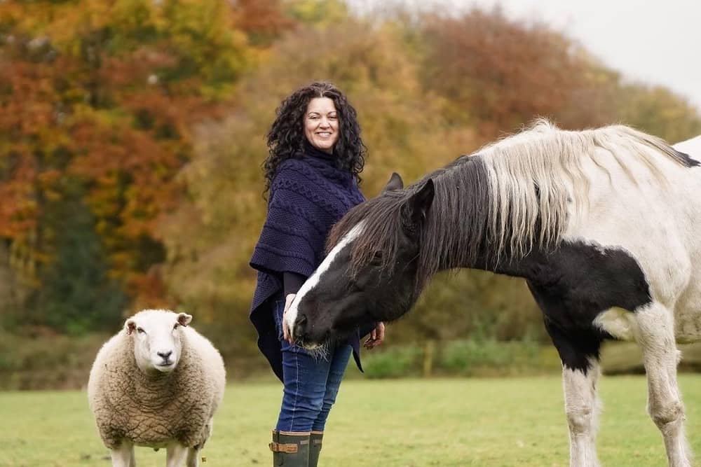 Therapist and author Grace Olson with some of her animals.