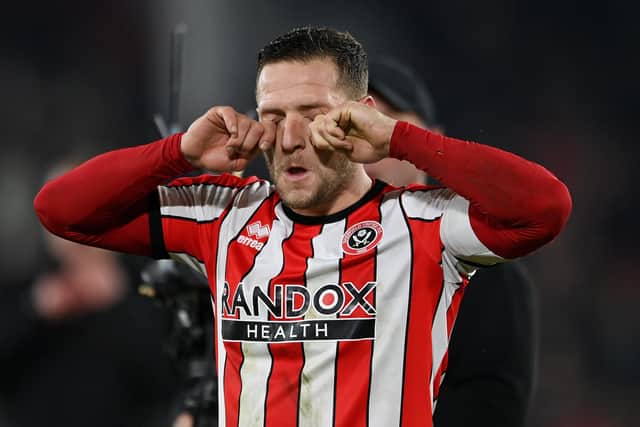 Billy Sharp of Sheffield United, simulates crying as they taunt fans of Wrexham following their side's defeat, during the Emirates FA Cup Fourth Round Replay match between Sheffield United and Wrexham (Picture: Michael Regan/Getty Images)