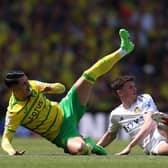 LEG UP: Norwich City's Borja Sainz slides in against Sam Byram