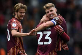 Bradford City's Max Power congratulates Bobby Pointon on derby day. Picture: Jonathan Gawthorpe