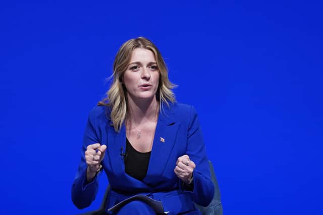 Dehenna Davison speaking on stage during the Conservative Party annual conference at the International Convention Centre in Birmingham.