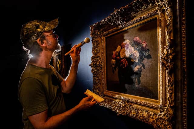 James Alderson, Freelance Art Technician preparing to clean the frame of the painting titled Pink Roses, 1881, Presented by Mrs Stephen Roskill from the collection of the late Henry Van Den Bergh, through Art Fund, 1973. Picture By Yorkshire Post Photographer,  James Hardisty.