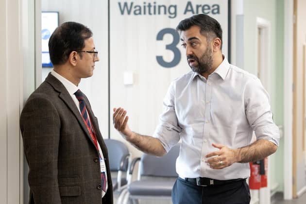First Minister of Scotland Humza Yousaf (right) meets a member of staff during a visit to visit the National Treatment Centre at Victoria Hospital in Kirkcaldy, Fife. PIC: Lesley Martin /PA Wire