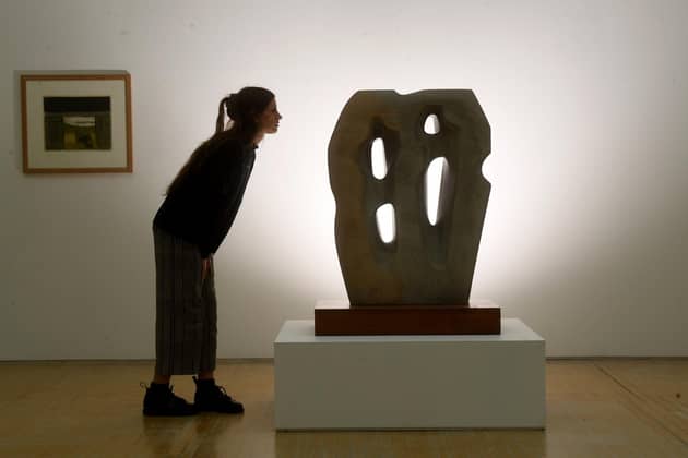 Exhibition An Axis of Abstraction Art in Cornwall and Yorkshire, Leeds Art Gallery. Dr Clare Nadal, Assistant Curator, Sculpture, Leeds Museums and Galleries with Barbara Hepworth sculpture Hieroglyph 1953. Picture: Simon Hulme