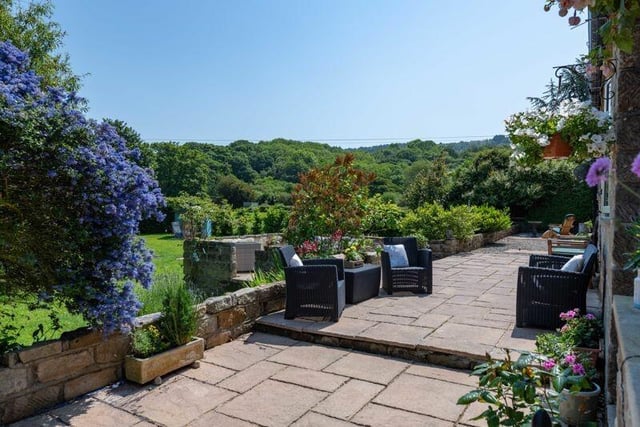 The grounds are private and tranquil with views over the countryside and the river beyond