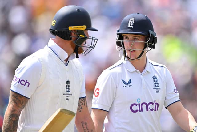 Ben Stokes, left, and Harry Brook leave the field at lunch on day four at Headingley. Photo by Stu Forster/Getty Images.