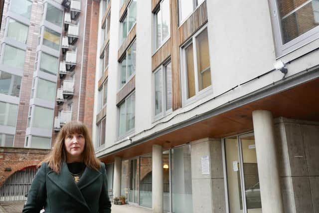 Rachael Loftus outside the Timblebeck apartment building in Leeds
