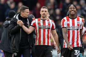 EXPECTATIONS: Sheffield United's manager Paul Heckingbottom (left) congratulates goalscorer Jack Robinson at full-time