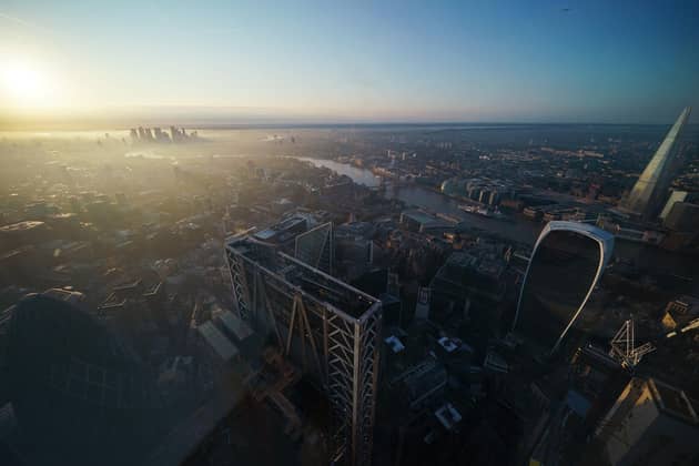 A view of the London skyline during sunrise, including Canary Wharf and the Shard from Horizon 22. PIC: Yui Mok/PA Wire