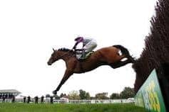 Impressive: Bravemansgame and Harry Cobden on their way to victory in the Charlie Hall Chase at Wetherby on Saturday.
