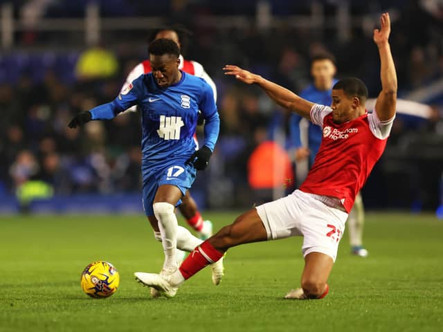 BIRMINGHAM, ENGLAND - DECEMBER 02: Siriki Dembele of Birmingham City is challenged by Christ Tiehi of Rotherham United during the Sky Bet Championship match between Birmingham City and Rotherham United at St Andrews (stadium) on December 02, 2023 in Birmingham, England. (Photo by Cameron Smith/Getty Images)