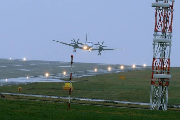 Storm Jocelyn: Major disruption amid flooding in York and travel affected including Leeds Bradford Airport
23 February 2017......   A plane lands at Leeds Bradford Airport before Storm Doris hits the area. Picture Tony Johnson.