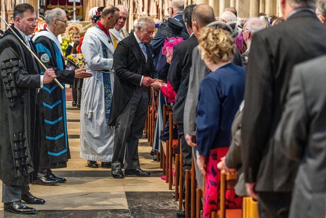 King Charles III distributes the Maundy Money during the Royal Maundy Service at York Minster. Picture date: Thursday April 6, 2023.