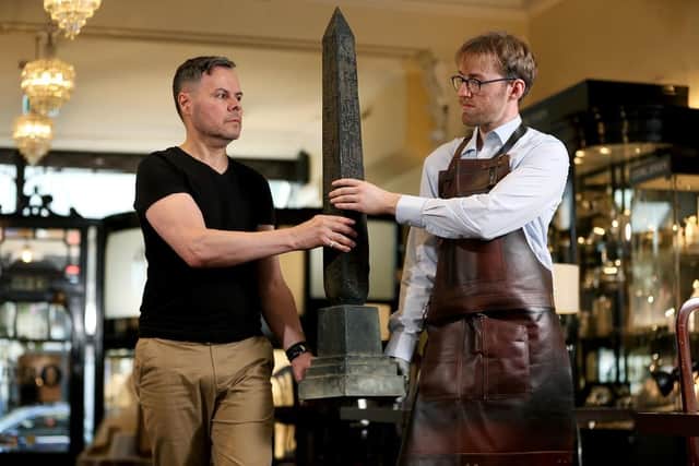 Roland Walrus-Antweil (left) and Liam O’Neill hold an Egyptian replica obelisk, made by James R Ogden. (Pic credit: Lorne Campbell / Guzelian Media)