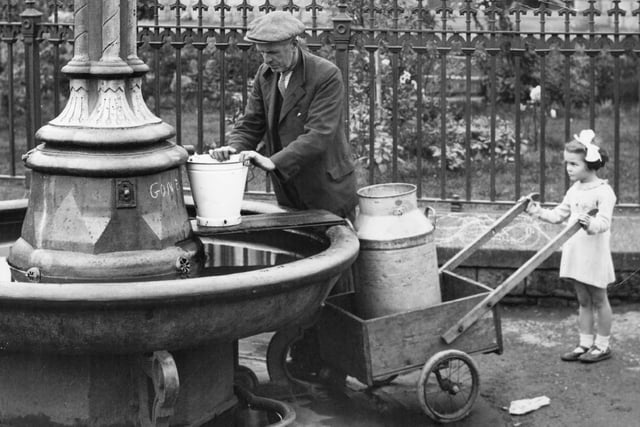 12th October 1937:  More than 2,500 villagers in Keigthly, Yorkshire, had to use the village fountain to get water when two reservoirs completely dried up in a drought.  (Photo by Fox Photos/Getty Images)