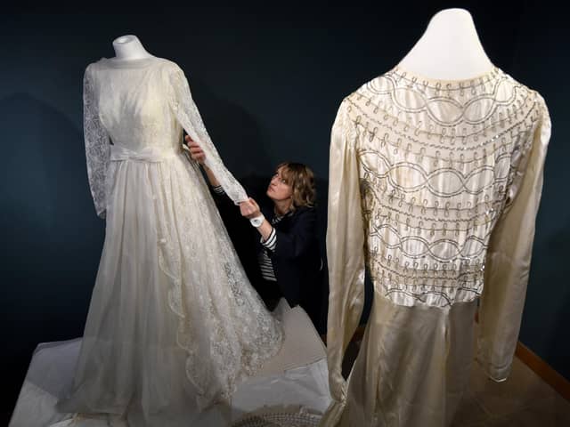 Wedding dresses from the ages exhibition at Ryedale Folk Museum, Hutton-le-Hole, Kirkbymoorside. Director of the Museum Jennifer Smith is pictured with a selection of Wedding dresses from the area..Picture by Simon Hulme