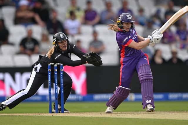 Superchargers batter Marie Kelly hits out watched by Originals wicketkeeper Ellie Threlkeld during The Hundred match between Northern Superchargers Women and Manchester Originals Women in front of a record crowd at Headingley (Picture: Stu Forster/Getty Images)