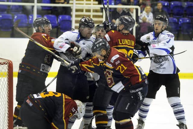 IN THE THICK OF IT: Andrew Payette (second left), during a fracas in the Guildford Flames goalmouth during the EPL Final against Sheffield Steeldogs back in 2014. The former Steeldogs player-coach died on Wednesday, aged 46. Picture: Steve Ellis.