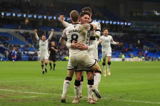 Middlesbrough's Riley McGree celebrates scoring their side's third goal of the game during the Sky Bet Championship match at the Cardiff City Stadium (Picture: PA)