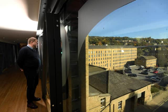 Plans for luxury homes have been revealed at Halifax's Dean Clough Mills complex. Chairman and MD Jeremy Hall is pictured at the site.