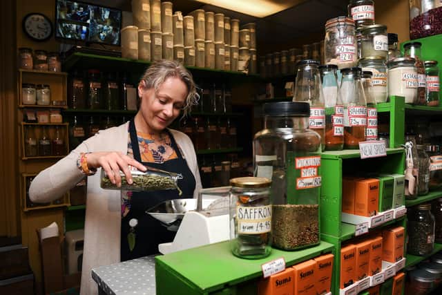 Tullivers Herbs and Wholefood in York, which is celebrating 40th years in business. Marta Ignatowicz weighs out spices.
Photographed for the Yorkshire Post by Jonathan Gawthorpe.