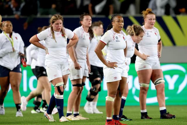 Gutted: England players react after their defeat in the New Zealand 2021 Women's Rugby World Cup final match (Picture: MICHAEL BRADLEY/AFP via Getty Images)
