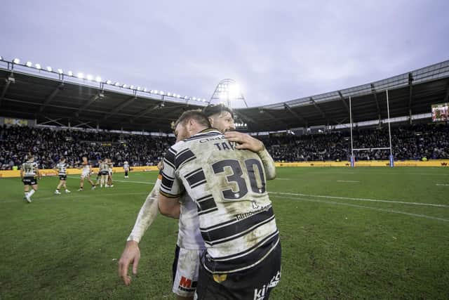 Scott Taylor embraces Gareth Widdop at the end of the recent game against Castleford Tigers. (Photo: Allan McKenzie/SWpix.com)