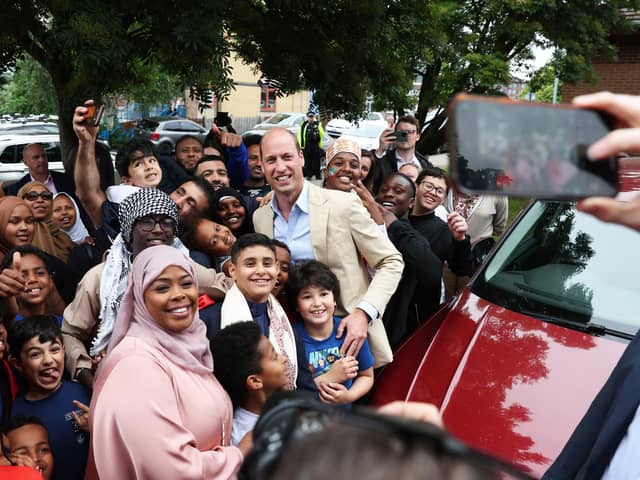 Prince William, Prince of Wales poses for a photo with members of the public during a visit to Reach Up Youth at the Verdon Recreation Centre on June 27, 2023 in Sheffield.  (Photo by Cameron Smith/Getty Images)