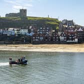 A fishing boat returns back to Whitby harbour. (Pic credit: Tony Johnson)