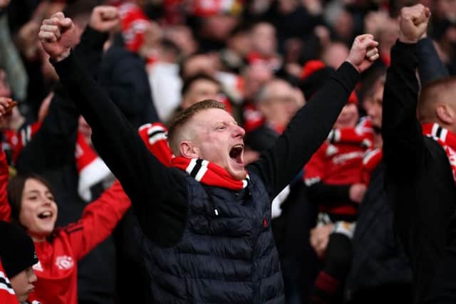 PASSION: Celebrations in the Manchester United end