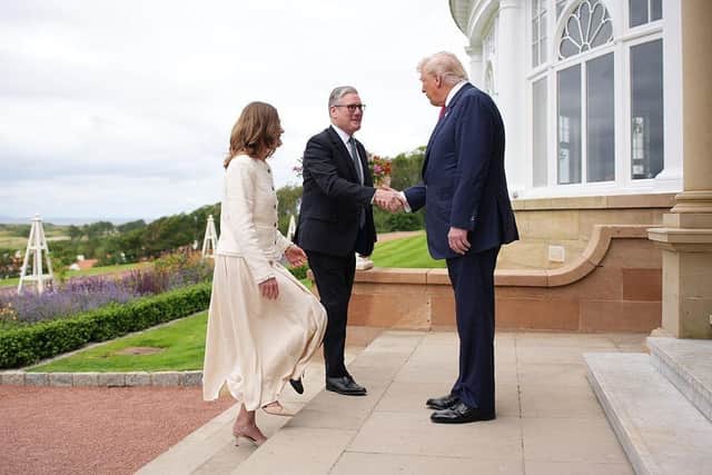 US President Donald Trump greets Prime Minister Keir Starmer and his wife Victoria at Trump Turnberry golf club (Picture: Andrew Harnik/Getty Images)