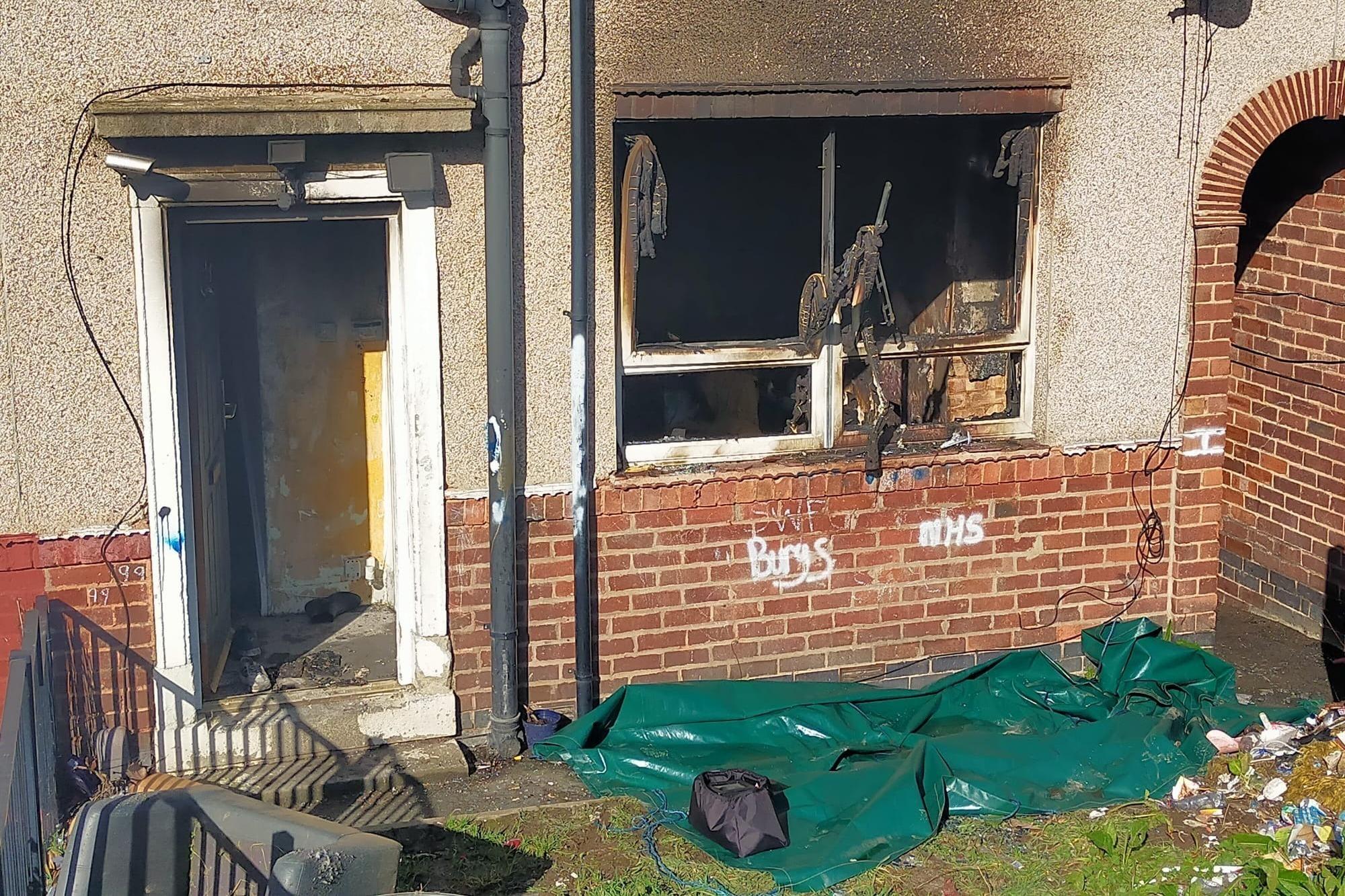 Man arrested after four people taken to hospital following house fire ...